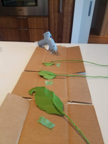 Preparing the leaves for attachment.